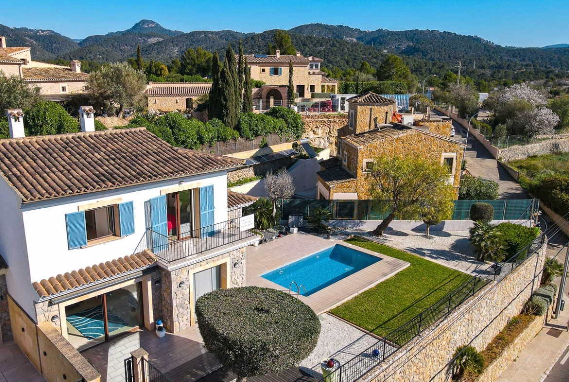 House, Pool and Garden view of a house in Es Capdella