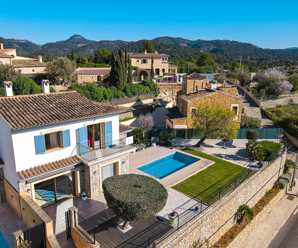 House, Pool and Garden view of a house in Es Capdella