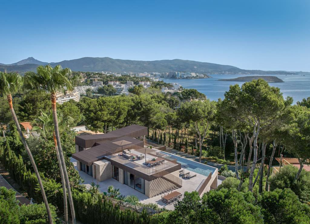 An image of a sea view project in Cap Falco, Cala Vinyes, highlighting a modern architectural design that takes full advantage of the stunning Mediterranean views. The property is set in a prime location, offering expansive floor-to-ceiling windows to capture panoramic vistas of the sea and surrounding landscape. The project features open-plan living areas, spacious terraces, and high-end finishes, designed for luxurious living. Outside, there are planned spaces for a private pool, gardens, and relaxing outdoor areas, providing the perfect coastal retreat in this exclusive area.