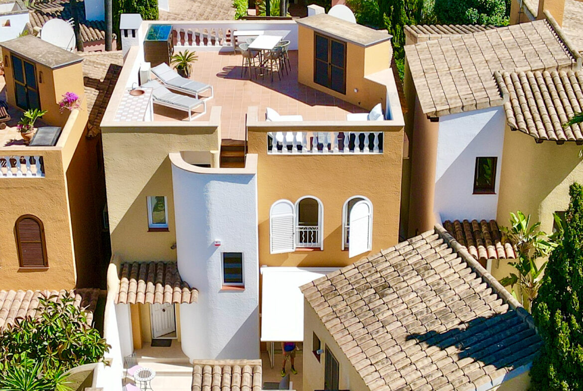 An image of a beautiful Torre-style house in Abubillas, showcasing classic Mediterranean architecture with distinctive tower elements. The house features a charming, rustic façade with terracotta roofing, arched windows, and a well-maintained garden. Inside, the home boasts spacious living areas, traditional stone walls, and modern finishes that enhance its timeless appeal. The outdoor space includes a private pool, terraced areas, and lush gardens, all offering a serene and private atmosphere, making this property a perfect blend of tradition and luxury.